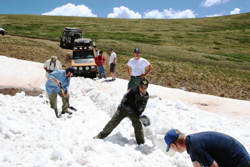 All of the available shovels went to good use, with the team removing snow from the drift.