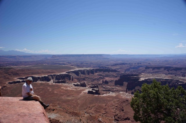 Moa2-Moonie overcomes his fear of heights to take in the view across Canyonlands NP