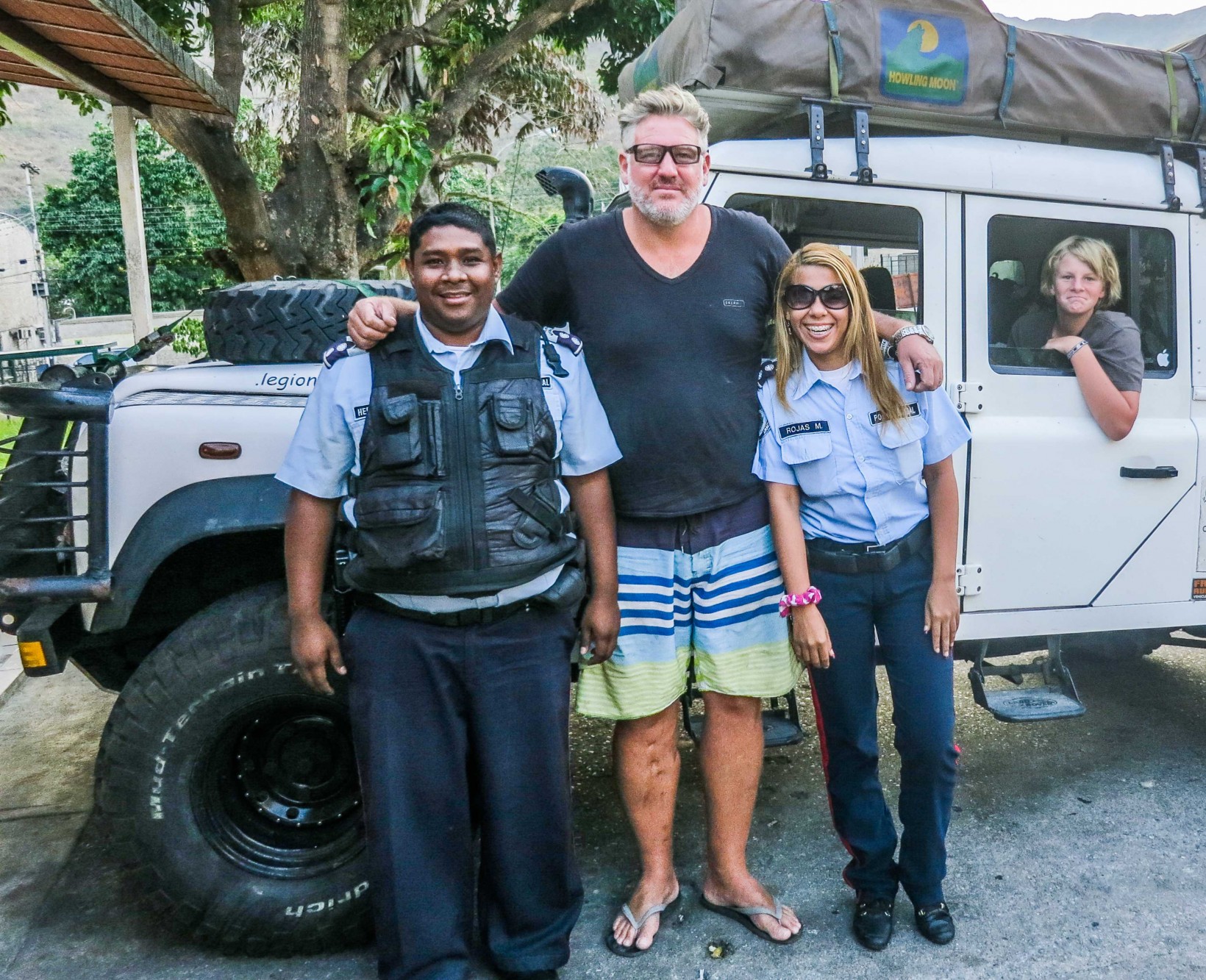 The police who had followed and harrased us for money pose for a photo. We never gave them a cent.