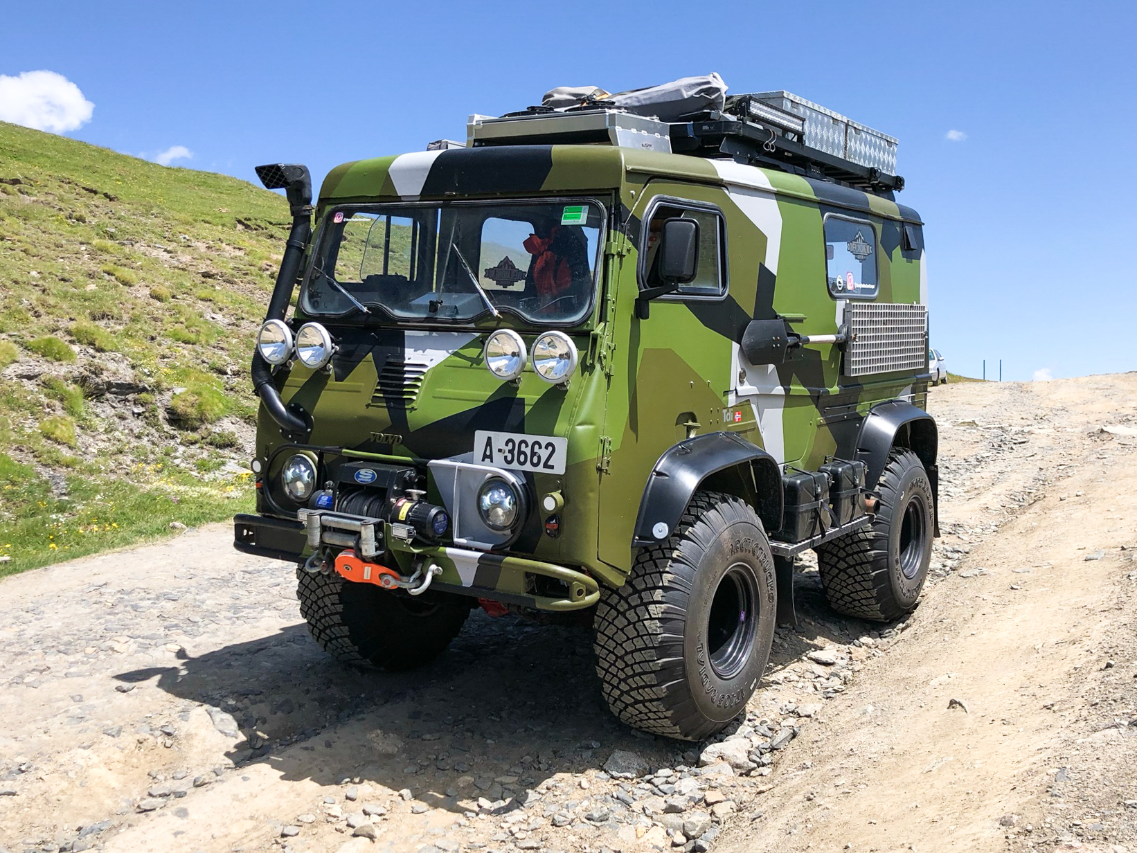 Swiss guy installs a wood-burning stove in his Volvo