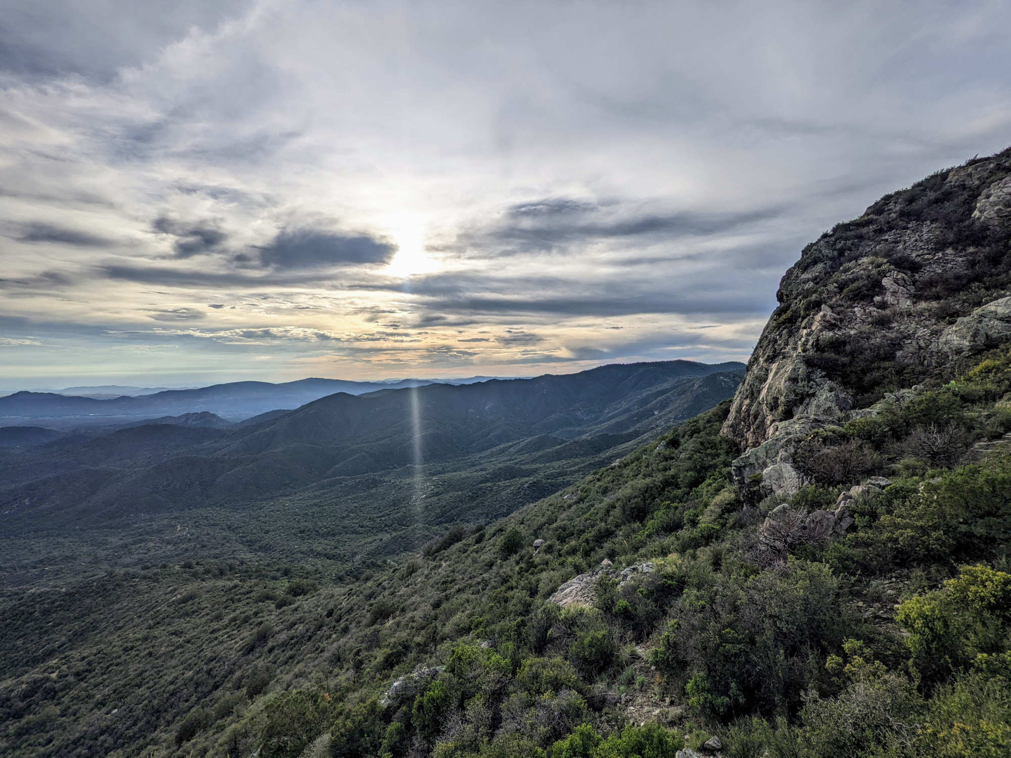 great campsite view of valley, sunset, and clouds