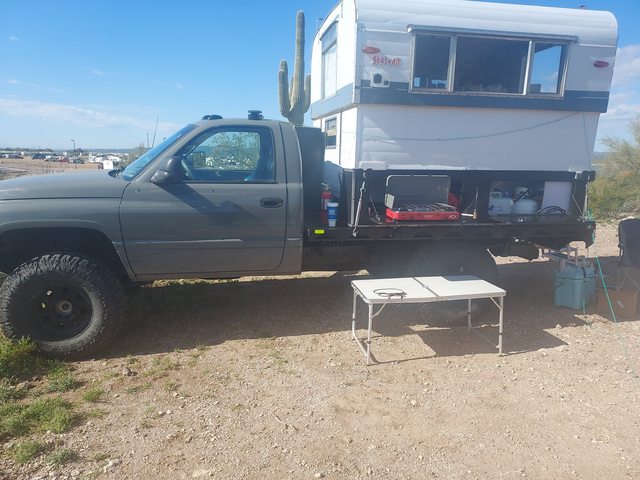 Ram 3500 camper at a campsite