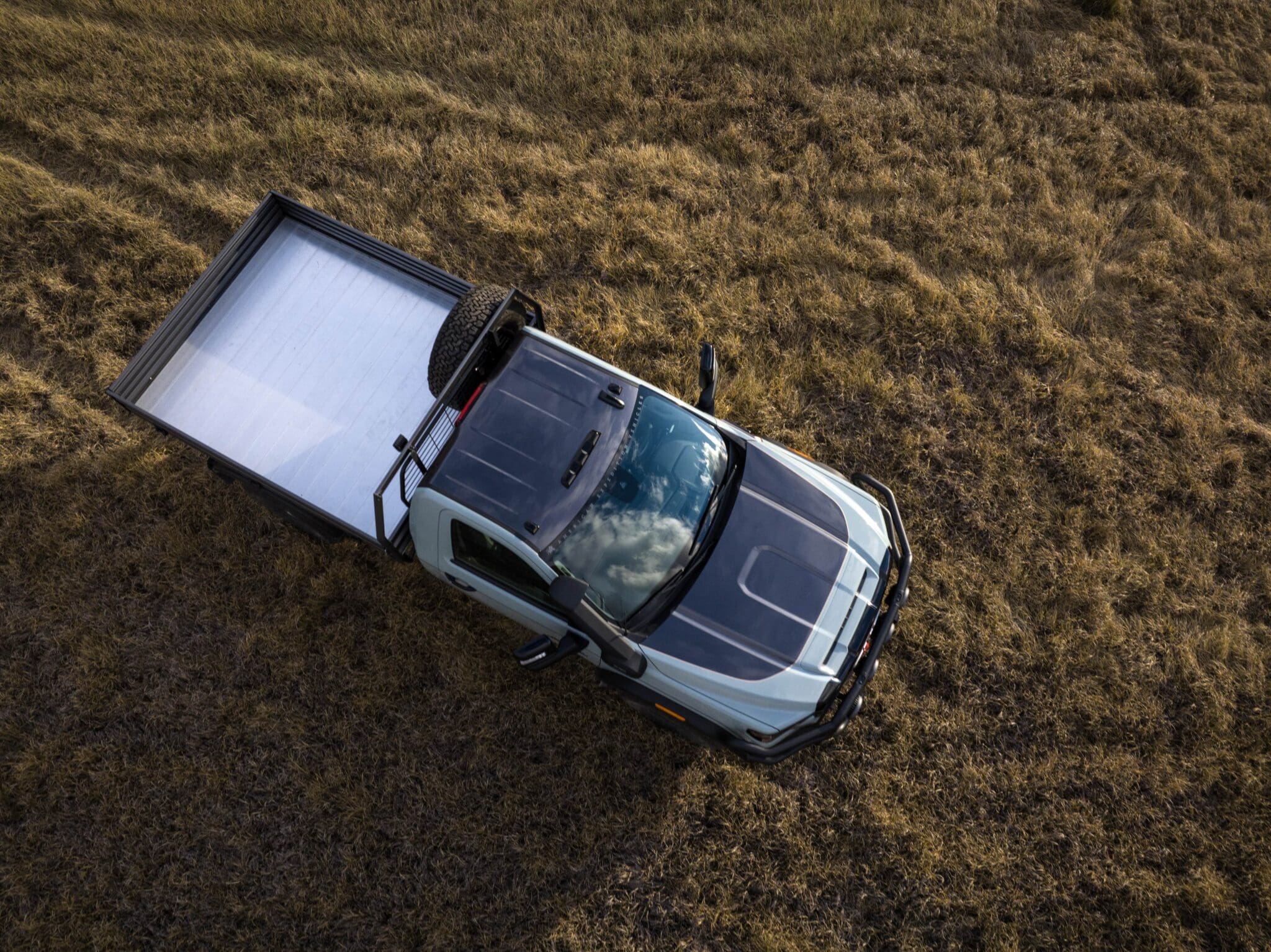 The AEV x GMC Sierra Grande Concept Debuts at SEMA 2023 - Expedition Portal