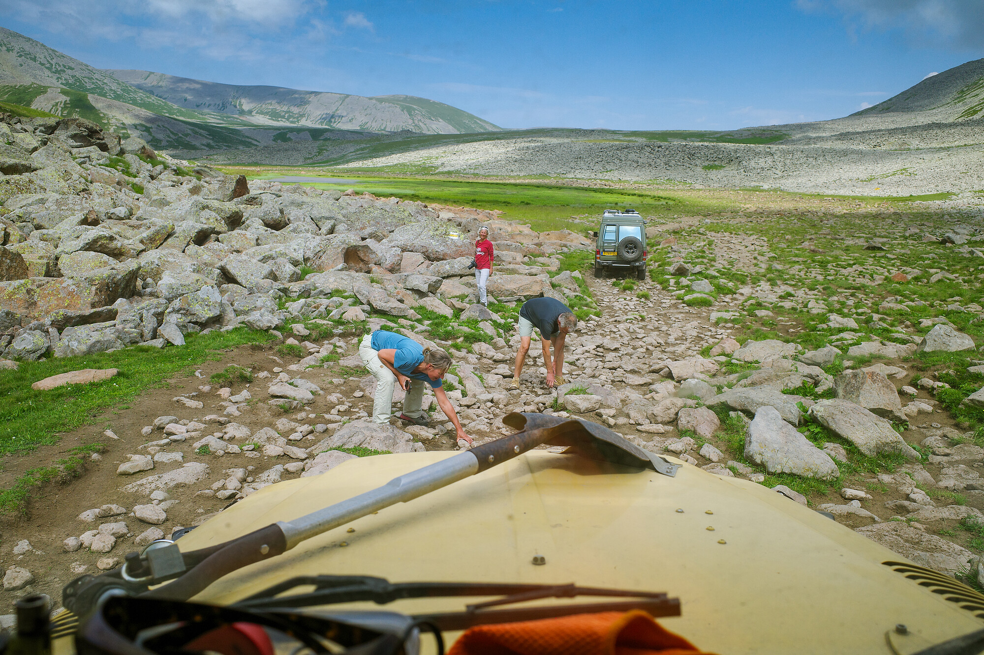 Man and Machine - moving rocks to make a path