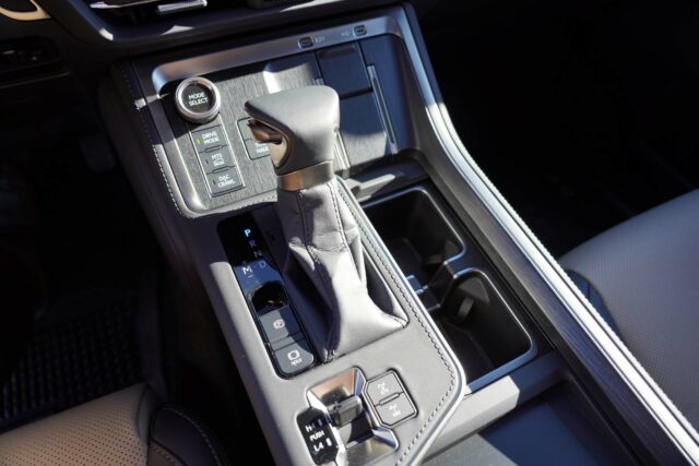 Lexus GX 550 Overtrail+ center console shifter and controls.