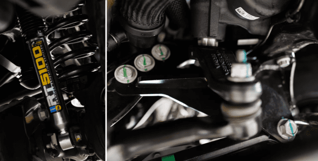 Close-up of vehicle suspension components, featuring an Old Man Emu shock absorber on the left and various metal parts, bolts, and hoses on the right—perfect for any Overland News enthusiast.