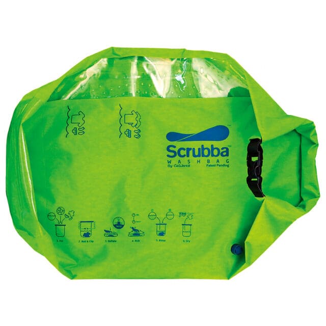 A bright green Scrubba wash bag with a transparent top, black buckle, and blue logo. Simple illustrated instructions for use are printed on the front. Perfect for doing laundry at camp, this bag is used for washing clothes while traveling or camping.