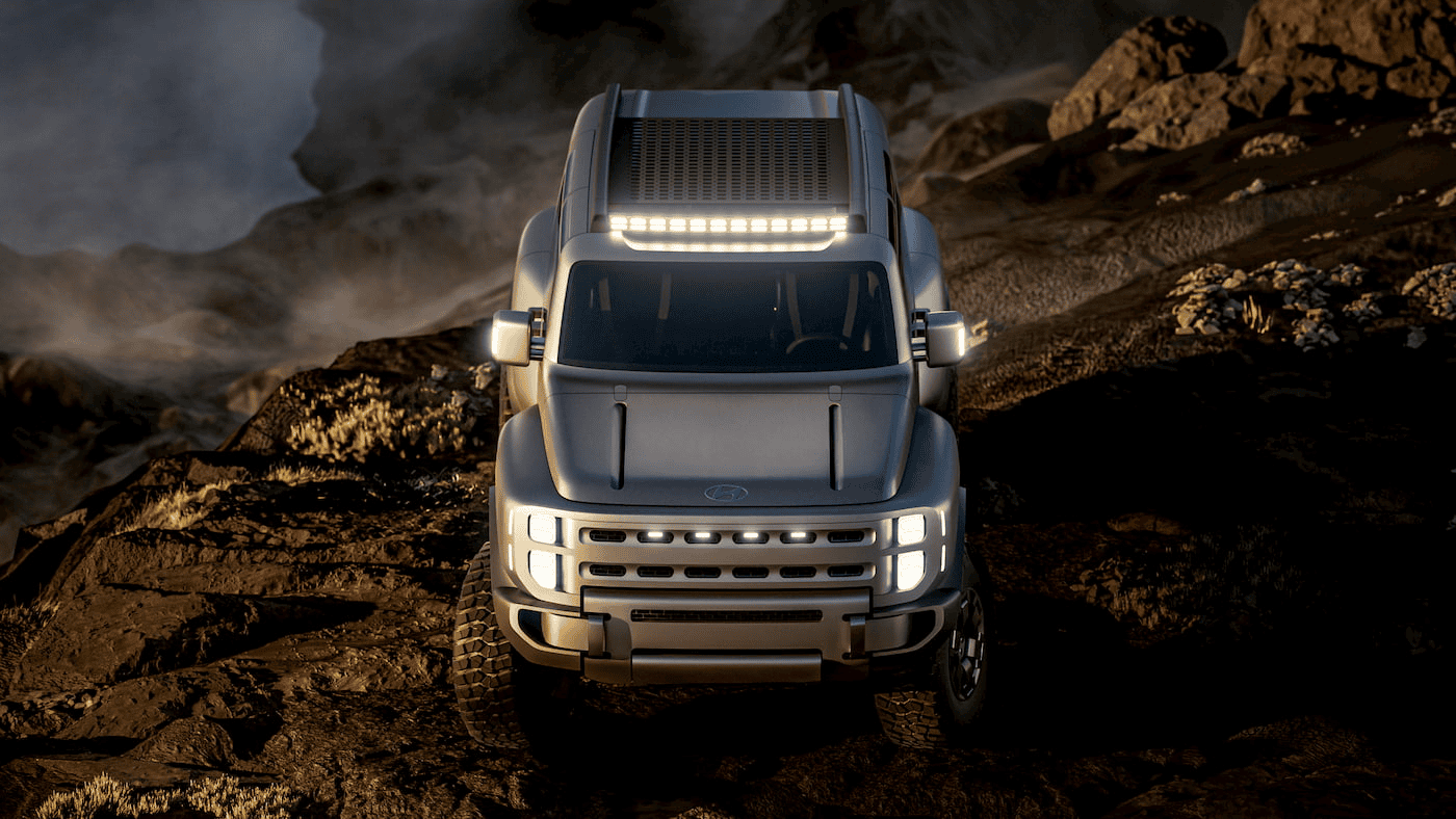A rugged, silver Hyundai off-road vehicle with LED lights is parked on rocky terrain near the edge of a cliff, with mist rising in the background and sunlight casting dramatic shadows.
