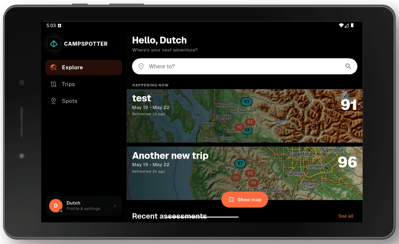 A tablet displays the campspotter app’s Explore page, showing upcoming trips with maps, trip names, dates, and numeric ratings. A search bar and navigation menu are visible on the left.