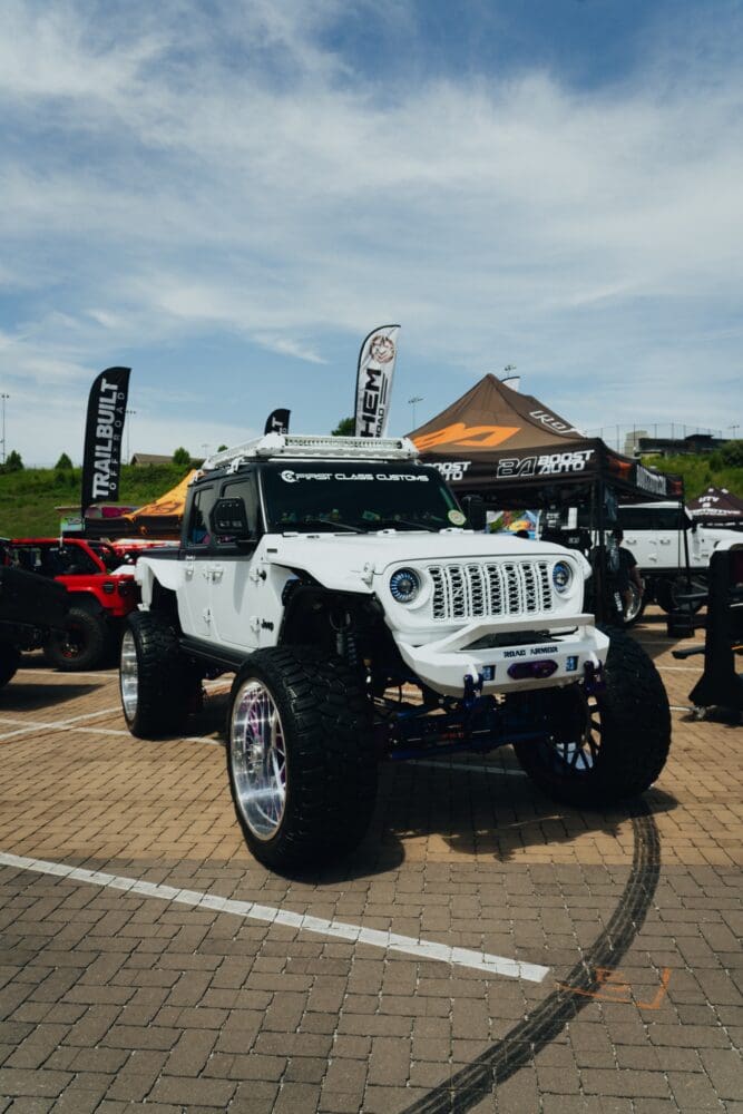 Custom white Jeep Gladiator with oversized wheels