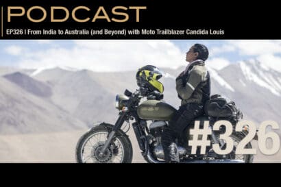 Candida Louis beside a motorcycle in a mountainous landscape, gazing upward with hands together; podcast text and episode details are overlaid, featuring Moto Trailblazer Candida Louis.