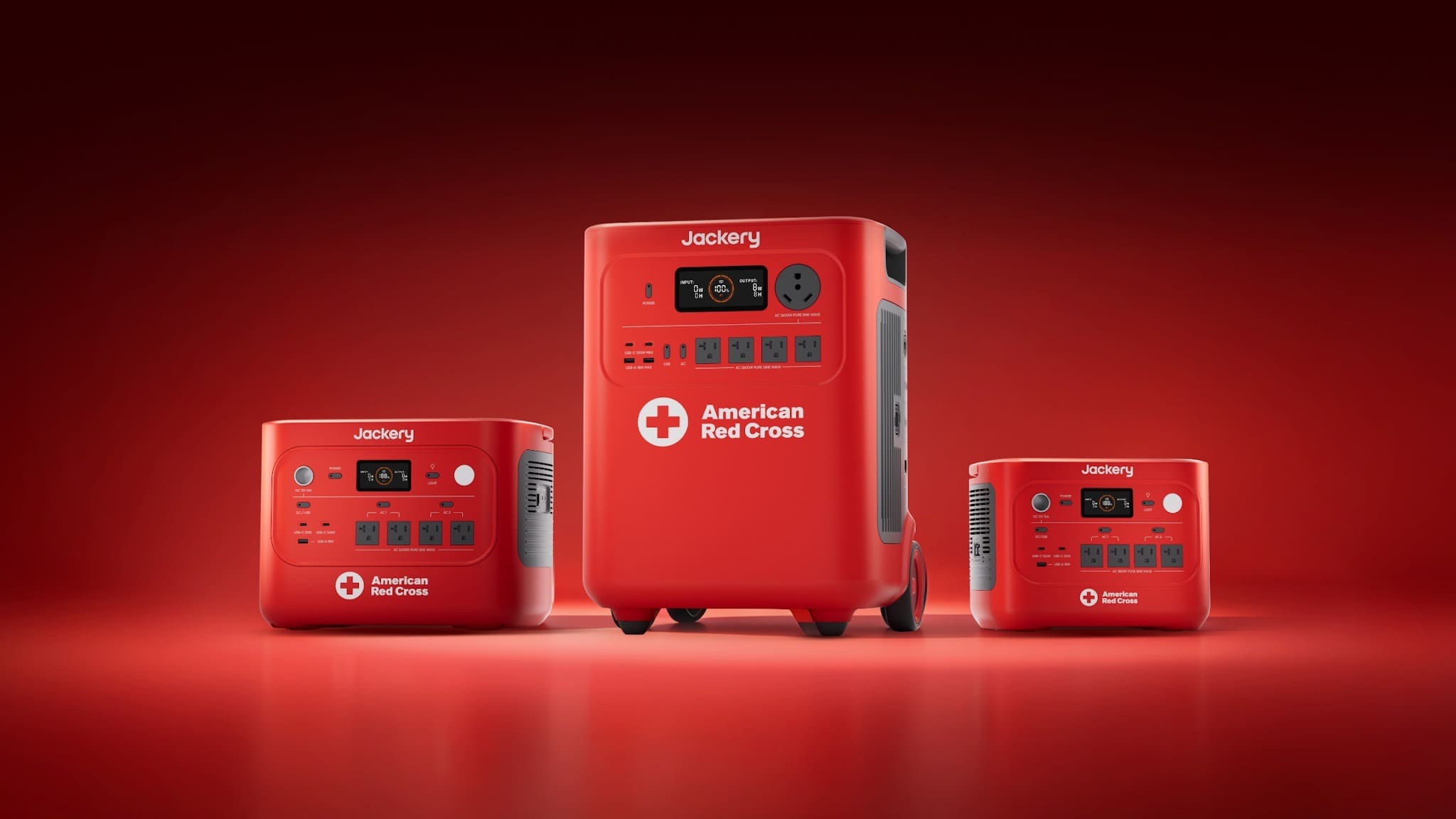 Three red Jackery portable power stations branded with the American Red Cross logo, as seen in Overland Weekly.